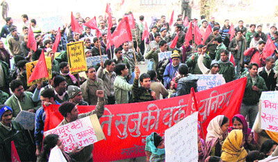 Members of the Maruti Suzuki Union stage a dharna in support of their demands in Gurgaon.