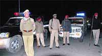 Punjab Plice jawans deployed in Model Town market during the New Year celebrations in Jalandhar on Tuesday night