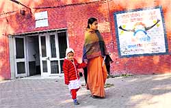 A patient returns home as there was no doctor in the dispensary at Hallo Majra in Chandigarh.