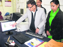 MC president OP Uniyal launches the councils website in Mussoorie on Wednesday.