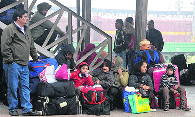 Passengers waiting for their train in chilly weather in Jalandhar. 