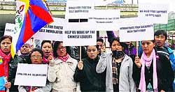 Representatives of the Tibetan Parliament-in-Exile hold a protest in Jammu on Wednesday