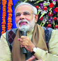 Gujarat Chief Minister Narendra Modi addresses the media in Gandhinagar on Wednesday.