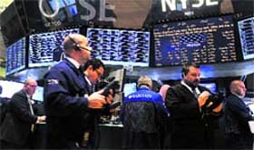 Traders work on the floor of the New York Stock Exchange on Wednesday.