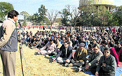Striking ministerial employees hold a protest in support of their demands at Parade Ground in Dehradun on Thursday