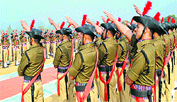 Recruits take oath prior to their passing out parade at Police Lines in Haridwar on Thursday