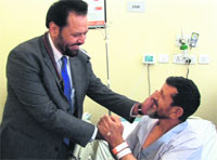 Dr M.S.Sandhu along with Abdil Latif of Afghanistan, who got dissolvable stents implanted at a Gurgaon hospital. Tribune photo: Sayeed Ahmed