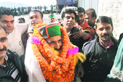 Kewal Singh Pathania, vice-president, HRTC, with supporters in Shimla on Thursday. Photo: Amit Kanwar