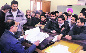 The tehsil office witnesses a huge rush of applicants for getting their registration of properties done in Jalandhar on Thursday.
