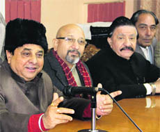 Arun Walia, president of the district unit of the Congress, along with other party leaders, addresses the media in Jalandhar on Thursday.