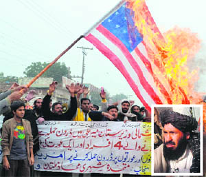 Pakistani warlord Mullah Nazir (inset); and demonstrators shout slogans against the drone attacks in Pakistans tribal areas during a protest in Multan on Thursday. 