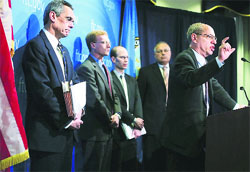 US Federal Trade Commission chairman Jon Leibowitz (R) speaks as chiefs of the Bureaus of Competition, Economics and Consumer Protection listen at a news conference regarding the agencys 21-month-long antitrust investigation on Google at the FTC headquarters in Washington, D.C. on Thursday.  AFP
