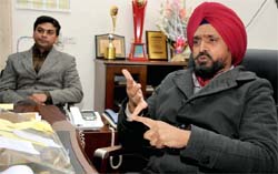 Inspector General of Police, Bathinda zone, Nirmal Singh Dhillon, makes a point while speaking about the problem of false rape cases being lodged with the police. Deputy Inspector General of Police Parmod Ban is also seen in the picture.
