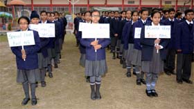 Students of class IX of Lord Rama Public School hold placards, urging the people to drive safely, during the Traffic Awareness Week being observed by the Traffic Police, in Bathinda on Friday.