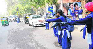 Harassed students look for an alternative mode of transport as the CTU buses remained off road in Chandigarh on Friday.