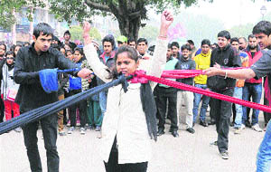 Artistes stage a play at the Sector 17 Plaza in Chandigarh on Friday. 