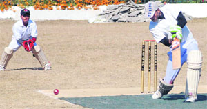 A batsman in action during a match in the 61st Dehradun District Cricket Tournament in Dehradun on Friday.