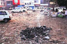 The parking space near the Qila road in Rohtak in a pathetic condition, causing inconvenience to vehicle owners and commuters.