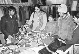 With a steep decline in temperature, people buy woollen clothes in Rohtak on Friday