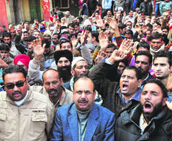 PHE employees during a protest in Jammu on Friday.