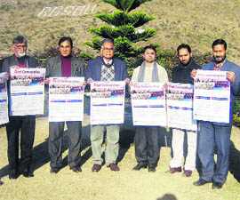 Vice-Chancellor Prof Irshad Ahmed Hamal along with other officials releases calendar of the varsity in Rajouri on Friday. 