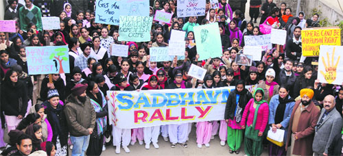 Students of the Sadbhavna Group take part in a rally to generate awareness about crimes against women in Raikot on Friday.