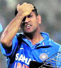 Indian captain M.S. Dhoni in despair after the heavy defeat in the second One-dayer in Kolkata.