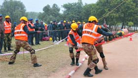 NDRF men conduct a mock rescue operation on the first day of the two-day training camp in Bathinda, on Saturday.