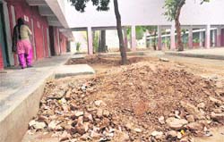 Debris lies scattered at Government Model High School, Sector 22, Chandigarh, on Saturday.