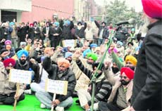 Members of the Organisation for Social Justice hold a protest in Mohali. 