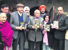 Nek Chand(centre) on the launch of a book in Chandigarh on Saturday. 