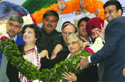 Chief Minister Sheila Dikshit along with Arvinder Singh Lovely, Kiran Walia and others at a convention of the residents of unauthorised colonies in New Delhi on Saturday. Tribune Photo: Mukesh Aggarwal 