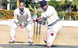 A batsman in action during a match in the 61st Dehradun District Cricket Tournament in Dehradun on Saturday