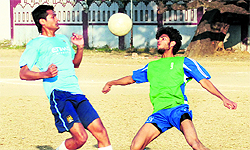 Players in action during a match in the 7th Abhishek Dabral Memorial Football Tournament in Dehradun on Saturday