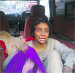 A mentally-challenged woman being taken to the Civil Hospital in Jalandhar on Saturday. A Tribune photograph