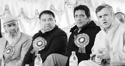Chief Minister Omar Abdullah with Minister of State for Rural Development Ajaz Ahmed Khan and MLC Ghulam Nabi Monga at a function in Srinagar on Saturday. Tribune photo: Amin War