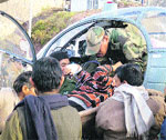 A villager being evacuated by the Indian Air Force in Reasi. A Tribune photograph