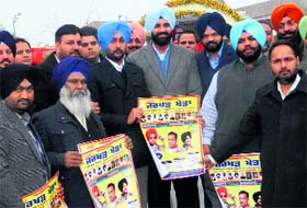 Punjab Cabinet Minister Bikramjit Majithia releases sticker of Jarkhar Sports Festival in Ludhiana.