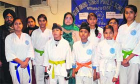 Students of Guru Gobind Singh Public School who will be participating in the Indo-Nepal Karate Championship 2012-13.