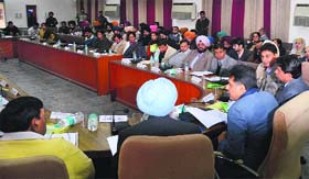 Union Minister Manish Tewari presides over a meeting of the District Vigilance and Monitoring Committee at Bachat Bhavan in Ludhiana on Saturday.