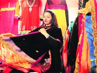 A colourful array of clothes on display at one of the stalls