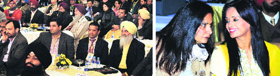 Participants at the NRI Sammellan in Jalandhar on Saturday (left); and former Canadian MP Ruby Dhalla with CPS Navjot Kaur. Tribune photos: Sarabjit Singh
