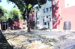 Damaged courtyard of the government house in Sector 16 that was recently vacated by former Punjab DGP PS Gill. 