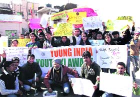 Members of the Young India hold a demonstration against the Delhi rape case in Dehradun on Sunday