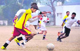 Players in action during a match in District-Level Football League in Haridwar on Sunday