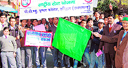 An anti-polythene awareness procession being flagged off by students of Panna Bhalla Municipal Inter-College in Haridwar on Sunday