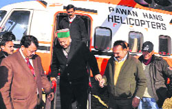 Chief Minister Virbhadra Singh arrives after launching the helicopter service of Pawan Hans at the Annadale ground in Shimla on Sunday.