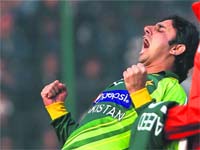 Saeed Ajmal celebrates his five-wicket haul