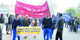 Students of Dasmesh Public School take part in a traffic awareness campaign on Monday.