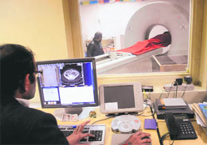 A patient undergoes a CT scan at the Government Multi Specailty Hospital, Sector 16, Chandigarh.